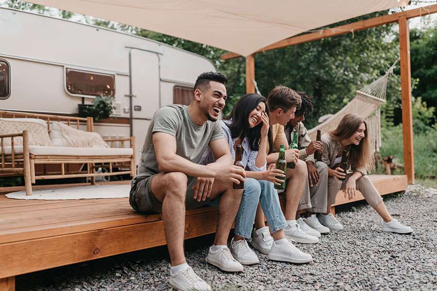 Where Can I Park My RV Long Term? 2 Sometimes the RVers need a long term RV Park or accommodation facility to keep their RV as they want to explore many more favorite destinations in a single tour. The majority of the RVers, when planning for an extended trip, look for an answer to know "where can I park my RV long term"? There are several RV parking places where you can easily place your RV or motor home for an extended period. Campsites, campgrounds, privately-owned and family-owned general, and luxury RV parks are some of the options where you can do long term camping. You can negotiate a robust and better price for your long-term RV parking at these commercial areas and campgrounds. In addition, if you stay at the camp or park for a longer time, the RV parks will offer you various advantages and discounts. Where Can I Get a long term RV Park Facility? If you want a comfortable and luxurious RV parking area for an extended period, you should consider the following areas. You will get all the adventure activities and on-site amenities on the following places. Let's discuss the details of each: KOA Campgrounds Whether you want to set up your RV for one month or a night, you will get excellent camping facilities at KOA campgrounds. KOA is located in top-rated and desirable locations. Also, it offers various advanced facilities and amenities to RVers. The campers and RVers can choose from the available three types of the parking facility. Those are: Journey Holiday and Resort All these types of campgrounds offer resort-style, adventure-based, and other simple facilities and amenities. The seasonal campers can also get the camping facilities here, and they can also stay in KOA campgrounds for a few nights. The seasonal camping cost or the monthly rent is also low. Moreover, the KOA website's reservation section and KOA app are very user-friendly. The RVers and campers can reserve their staying place by pressing a few buttons. However, compared to the 14-day or few days stay, the longer-term camping is much different. The KOA asks the guests to make a call directly to them if they want to camp for an extended period. The RVers can quickly get more perfect and accurate information just by making a phone call. You can get up-to-date news, long-term availability, and all the details information by making a call. Privately-Owned Parks You will get a permanent camper setup facility in most privately-owned resorts and RV parks. In addition, most private property, including parks and resorts, offers the RVers stay facilities for the longer term. Now how long can you stay in an RV park? It depends on the park's policy, rules and regulations. Some private park doesn't advertise their extended-period parking facilities, but you will come to know about it if you ask them. Before your trip, you can directly call the park authority to see whether they offer the facility of RV parking on residential property or their private property. Luxury RV Parks Long-term RV parking facilities are available at many luxury resorts and RV parks. But one problem with the luxury RV parks is that you may have to spend huge amounts of money. However, try to book the park in advance, it will help you to save some money on your expenditure. Another drawback of this option is that the luxury parks remain heavily crowded, mostly during camping season. So reserving your seat in the luxury park in advance is a great idea. At Relative or Friend's Property RV parking on residential property is a great option. And you can place your RV or motorhome on your friend or relative's property. But before doing that, you have to take permission from them to put your vehicle in front of their property. If they allow, you can certainly park your car, and this option will undoubtedly save your money. Outdoor RV Storage Option Many people search for "long term RV parks near me" to get the cheaper option. However, for those people, outdoor RV storage is the best option. This storage also allows you to park your RV for a longer time. You can simply park your motorhome or RV in the RV outdoor storage and leave. It is a viable and affordable solution for most RVers. RV Parking in Driveway If you have limitations in finding the nearest RV parking area near you, you can store your vehicle on the driveways. But one crucial determining factor is whether the RV will fit in the driveway or not. For longer-term parking, you need spacious space so that other vehicles and people can quickly move beside it. Also, the eave's highest height or your roof's overhangs is another considering factor if you want to park your RV in the driveway for an extended period. Before placing your car in the driveway for a longer period, you have to make sure that it has enough space. Covered Storage Facility Another easy option for keeping your RV for the long term is a covered storage facility. You should find one in your camping area or home area where you want to place your vehicle for a more significant period. If you are in the colder region's habitat, the popular option for parking your RV in the long term is a covered storage facility. If you are camping in the mountain town, you should look for the covered storage facility at a relatively lower elevation. If you find a storage facility which is 1 hour driving way from your camping area, it would be better. Storing the RV for the long term in a storage facility is highly recommended. Placing your vehicle in this area will definitely decrease the plenty of moisture accumulation in your RV. Also, this place impacts the integrity of the RV's windows, roof, window seals, roof seams, and other parts during the snowy or rainy season. Purchasing or Renting Land Because of the location, time frame, RVer's age, and many more factors, staying at the RV Park becomes impossible for many RVers. However, again some campers and RVers crave fewer restrictions and open space. For them, one of the best options for parking their RV for the long term is renting or purchasing the land. Purchasing or renting land is one of the most viable choices as many RVers don't want to live off-the-grid. Finding the rent or private property sale may seem a tough job to you, but it's not at all. By searching the local paper's classified section exploring and purchasing the RV-deeded land is possible. So if you have enough money to purchase or rent an open ground to keep your RV for longer-term, it's a perfect option. Club's Memberships You can get a long term camping and RV parking facility by having the memberships of renowned RV clubs. Discount clubs are the most excellent option for those who want both savings and exclusivity by keeping their RV for an extended period. The RVers can get subsidies on their long-term travel cost and lower monthly rent by becoming the discount club's members. In addition, some discount clubs offer overnight discounts; member parks benefit, easy to use a search engine, and many more facilities. Thus this option could be a good choice for you. The Way to Find Long Term RV Parking Facility After fixing the specific traveling area that you want to explore, the next job is to search for the perfect place where you can place your RV for long term. Though there is no one-stop service center available on which you will get the short-term, permanent and long-term RV parks information. But your searching job becomes more accessible with the help of various resources. Excellent resources are available using which you can quickly get the answer to your question "where can I park my RV long term." Several travel apps are also available, using which you can find the residence RV park near you. While using the app, you have to apply a filter for rates, locations, amenities, and various rules and restrictions. Wherever you need a spot for you, from the luxury RV resorts to private RV parks, you can easily find the more extended-term RV parking facility. Conclusion The long term RV Park issue is a matter of headache for many first-time owners. But hopefully, after reading the above informative guide, now you have enough clarification about it. However, if you want to travel and explore the world more, you have the opportunity to keep your RV or motorhome in several places for an extended period. Every type of parking facility is available for you from free to paid. As many RV owners depend on the long-term parking option, they should do a little research on the facilities available at different places. Then according to their requirement, they can pick any option for parking their RV. Keeping the RV in a safe place will prevent unnecessary damage. So make sure you are taking the best care of your vehicle by parking it in the best spot for longer-term.