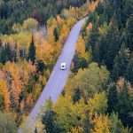 How to Choose the Best RV for your Trip 6 RV on a trip through the road in the woods