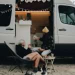 Which Pet-Friendly RV Rental Company is the best for you? 7 Couple enjoying their pet friendly RV