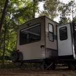 Trailer with RV slide topper replacement