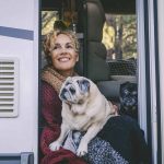 Woman with dog who uses RV dog fence